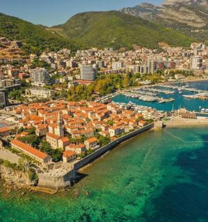an aerial view of a town on the water