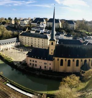 an aerial view of a city with a river
