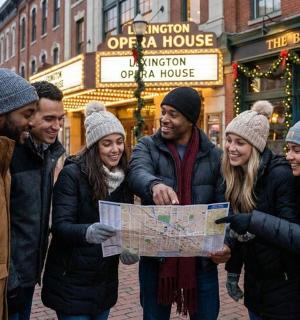 a group of people looking at a map