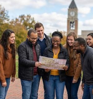 a group of people standing in front of a clock tower