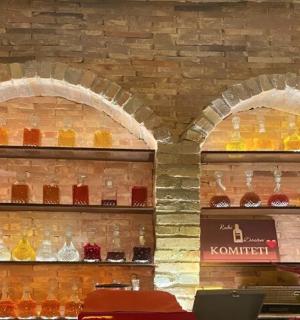 a store with two shelves filled with drinks