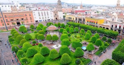an aerial view of a park in a city