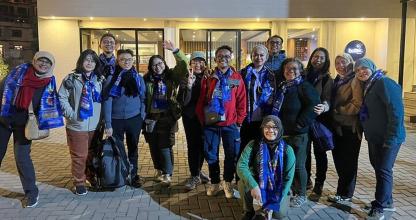 a group of people posing for a picture