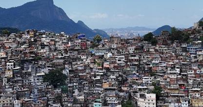 a large city with buildings on a mountain