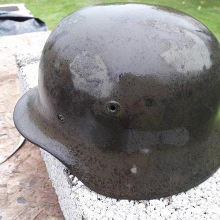 a black helmet sitting on top of a table