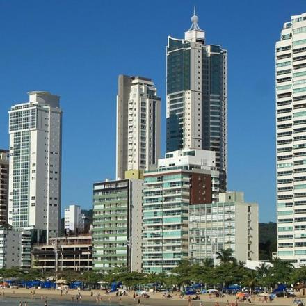a group of tall buildings in a city