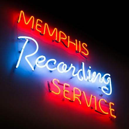 a neon sign that reads memories recording impulse