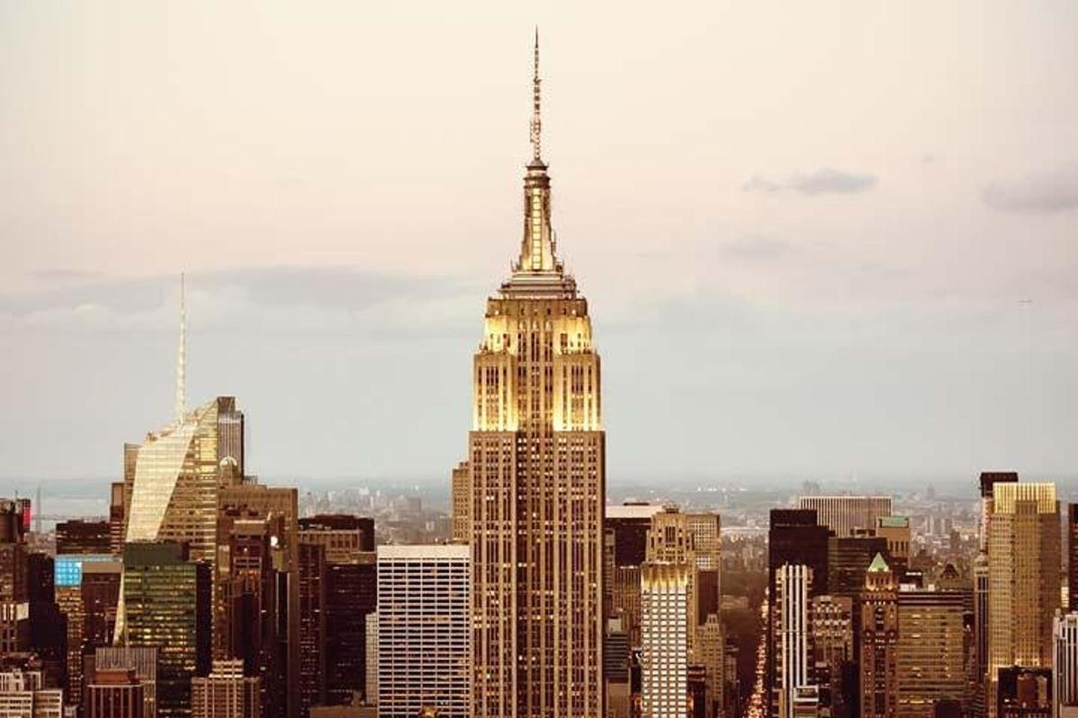 a view of the empire state building in a city