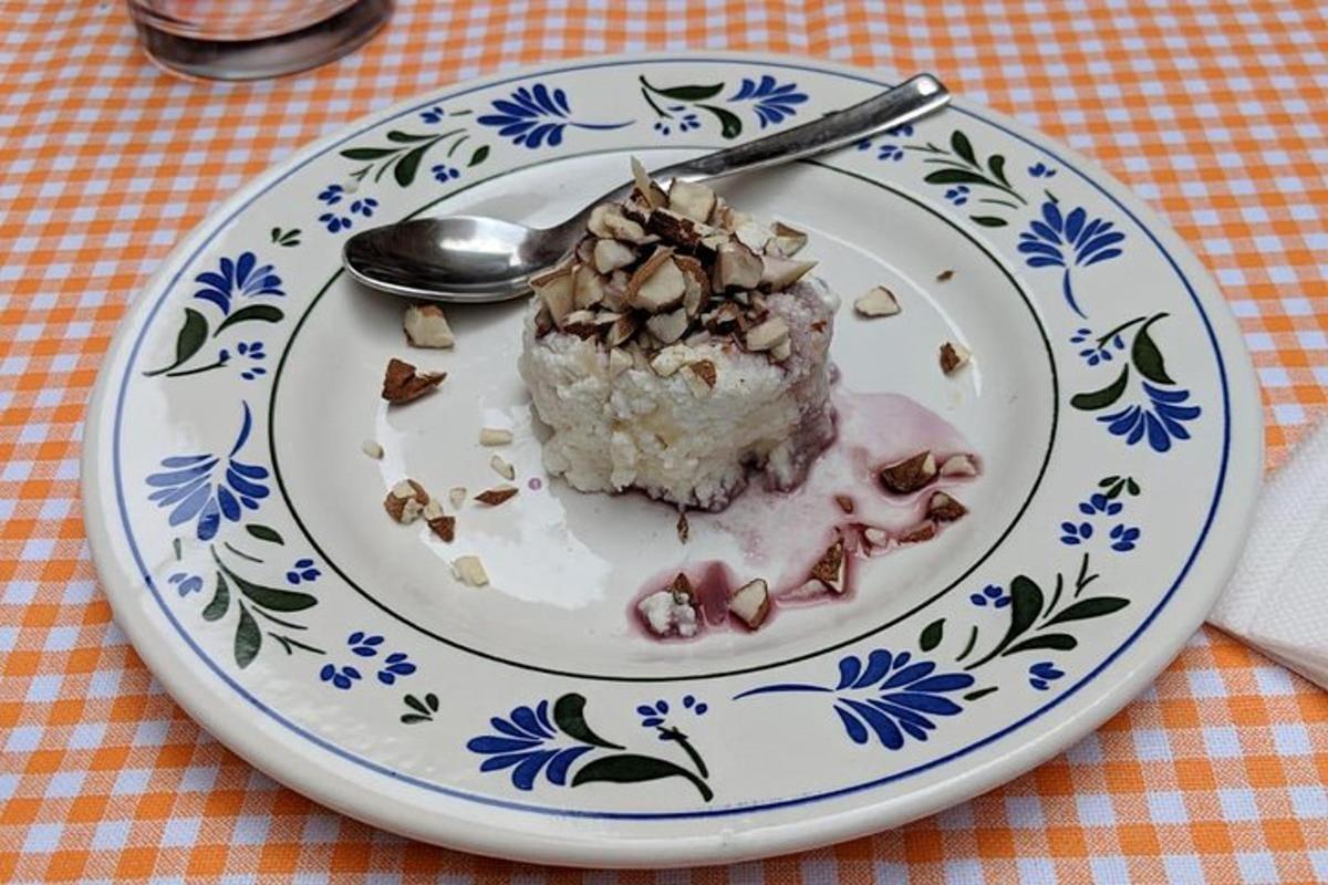 a piece of cake on a plate with a spoon