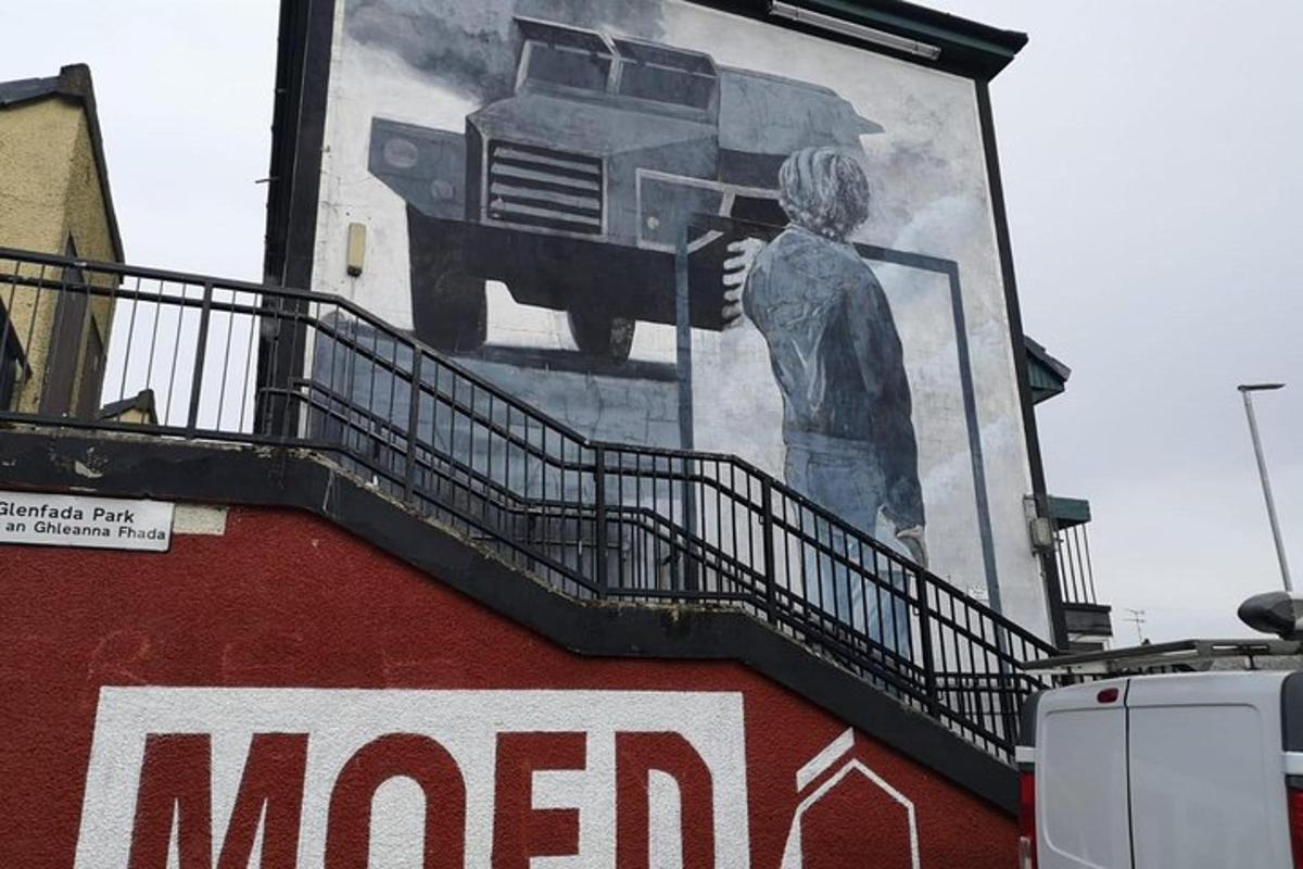 a mural of a truck on the side of a building