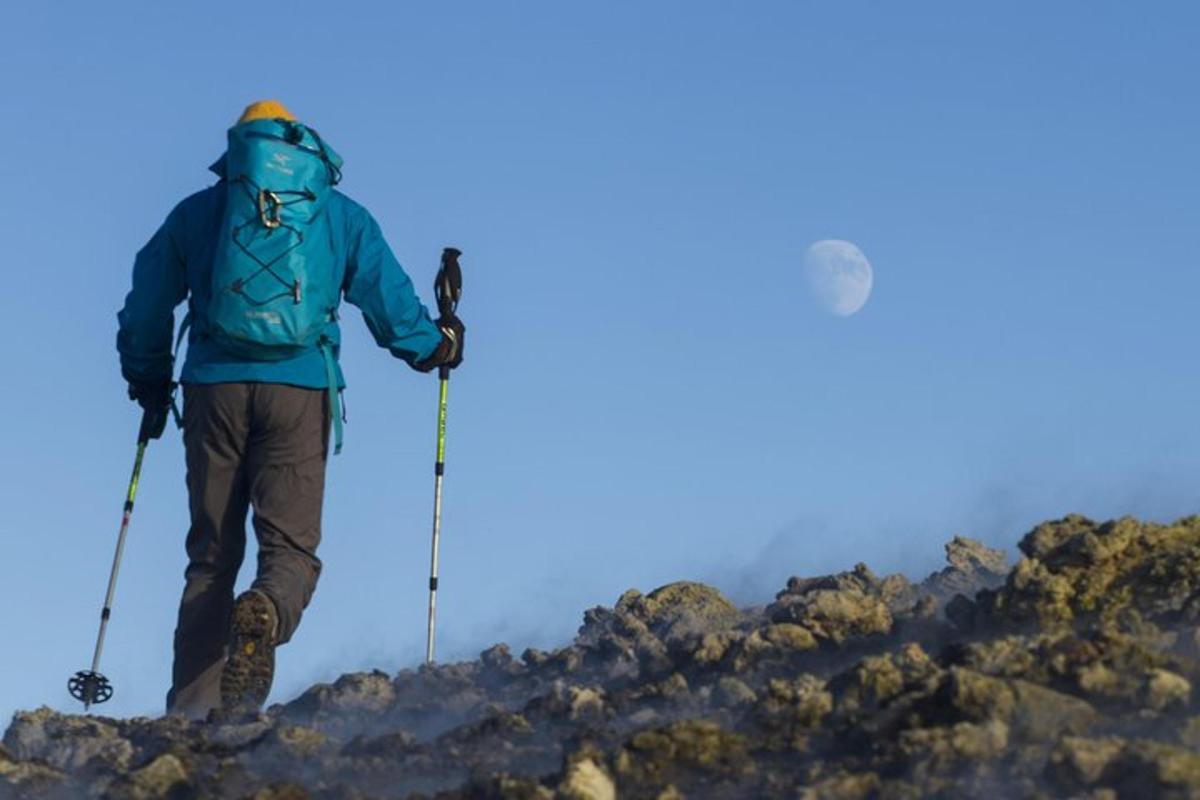 a man standing on top of a mountain