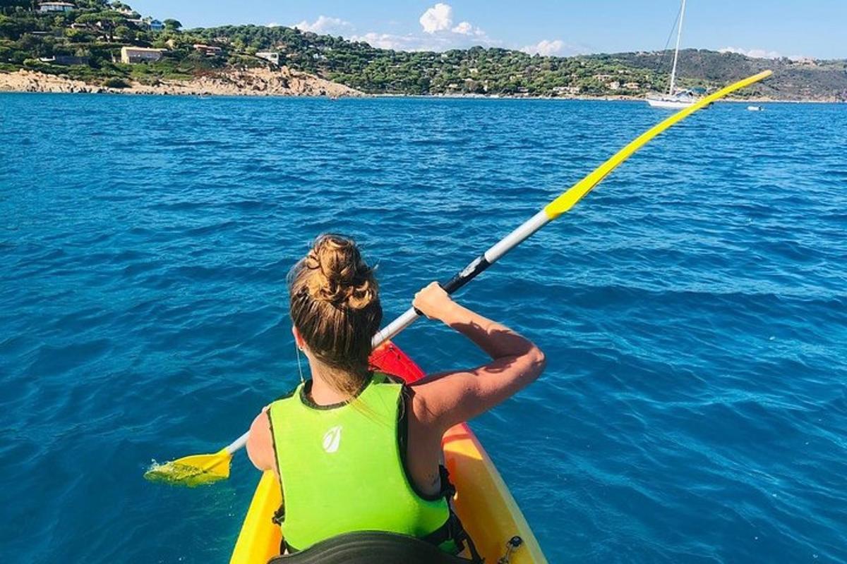 a person in a kayak in the water