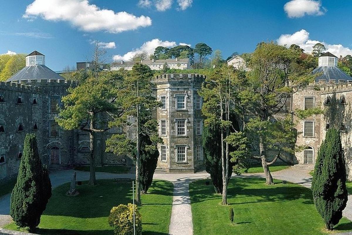a large building with trees in front of it