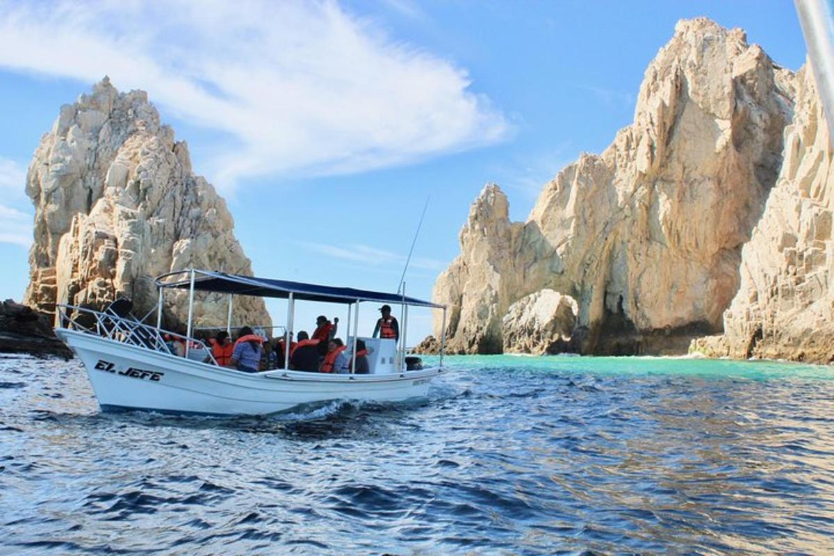 a group of people on a boat in the water