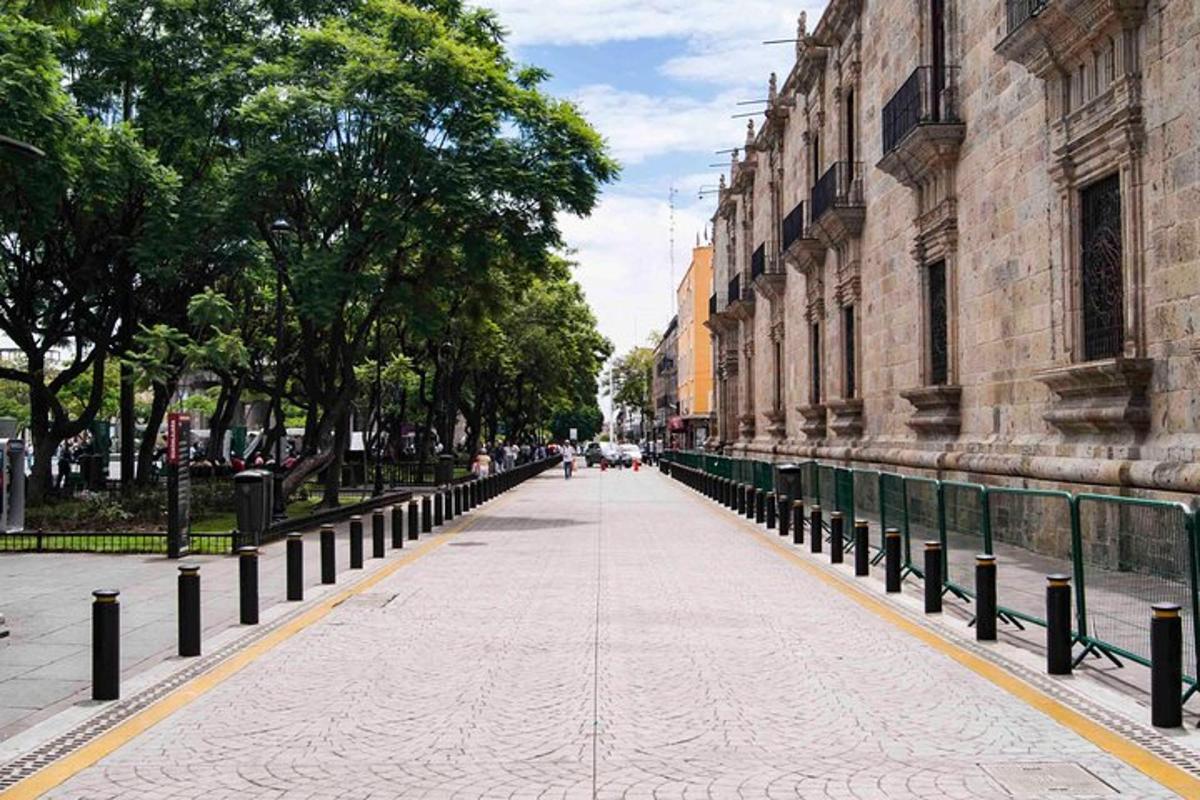 an empty street in front of a building