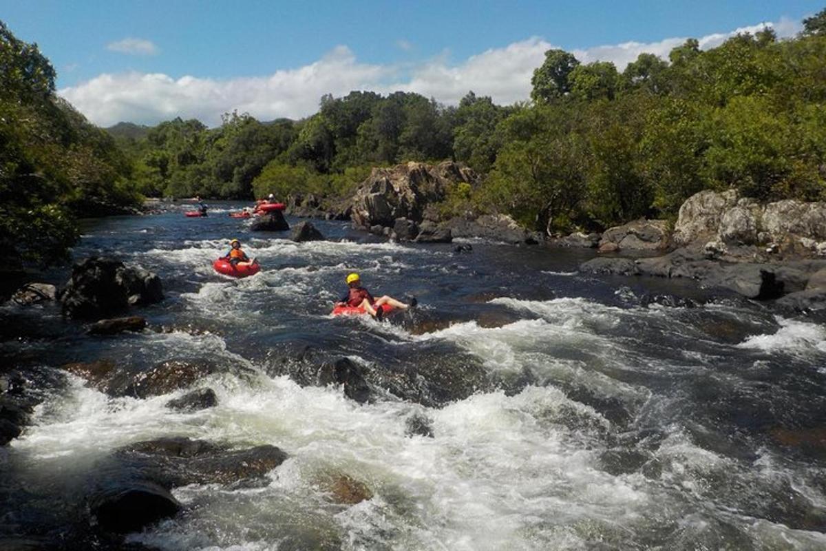 a group of people rafting on a river