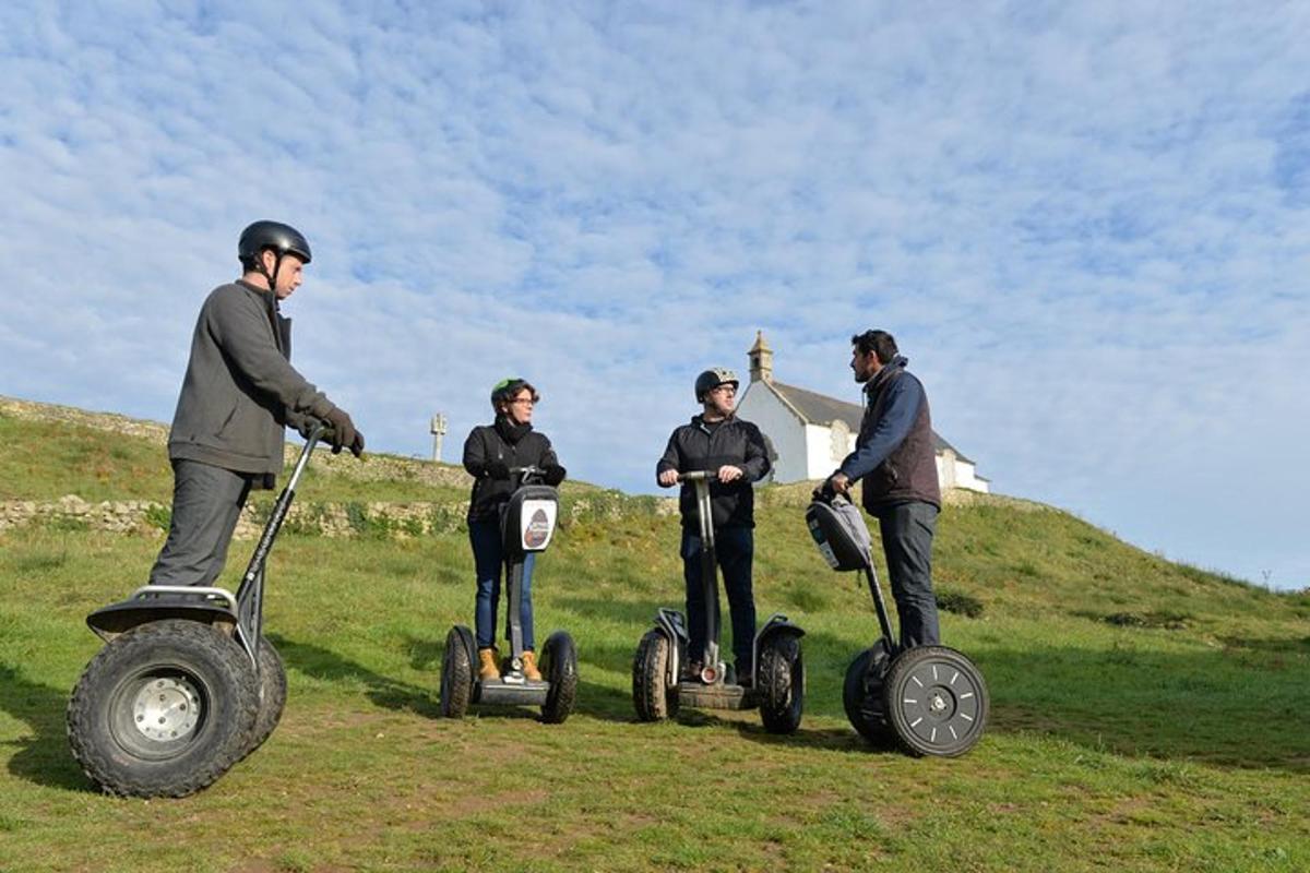 a group of people riding segifts on a field