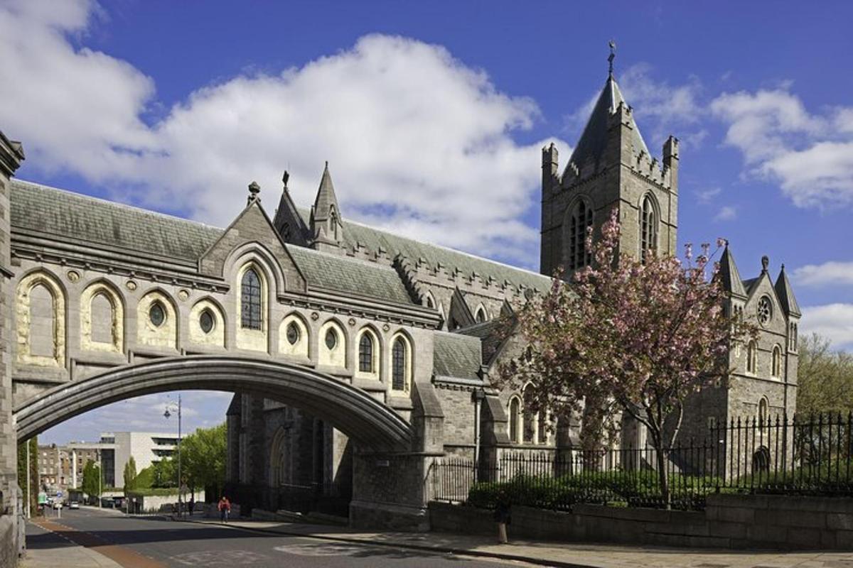 a large building with a bridge and a church
