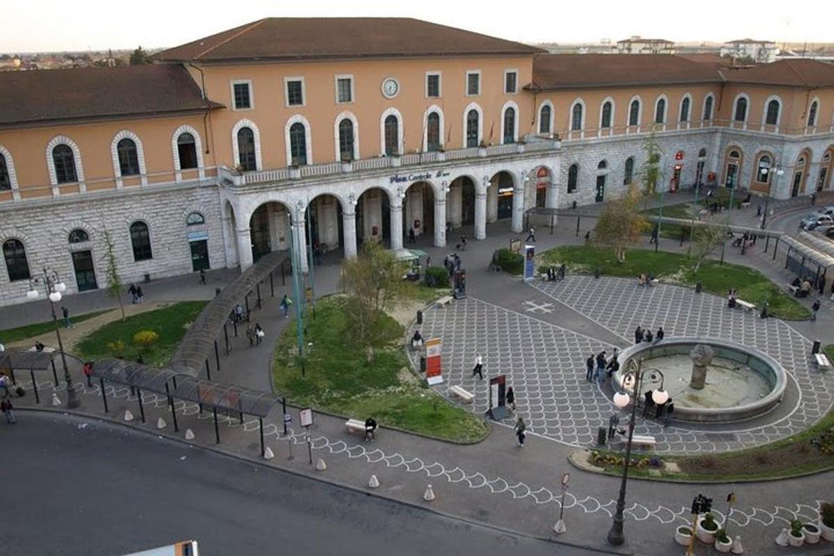 a large building with a courtyard in front of it