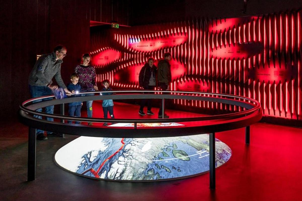 a group of people standing on a table in a room