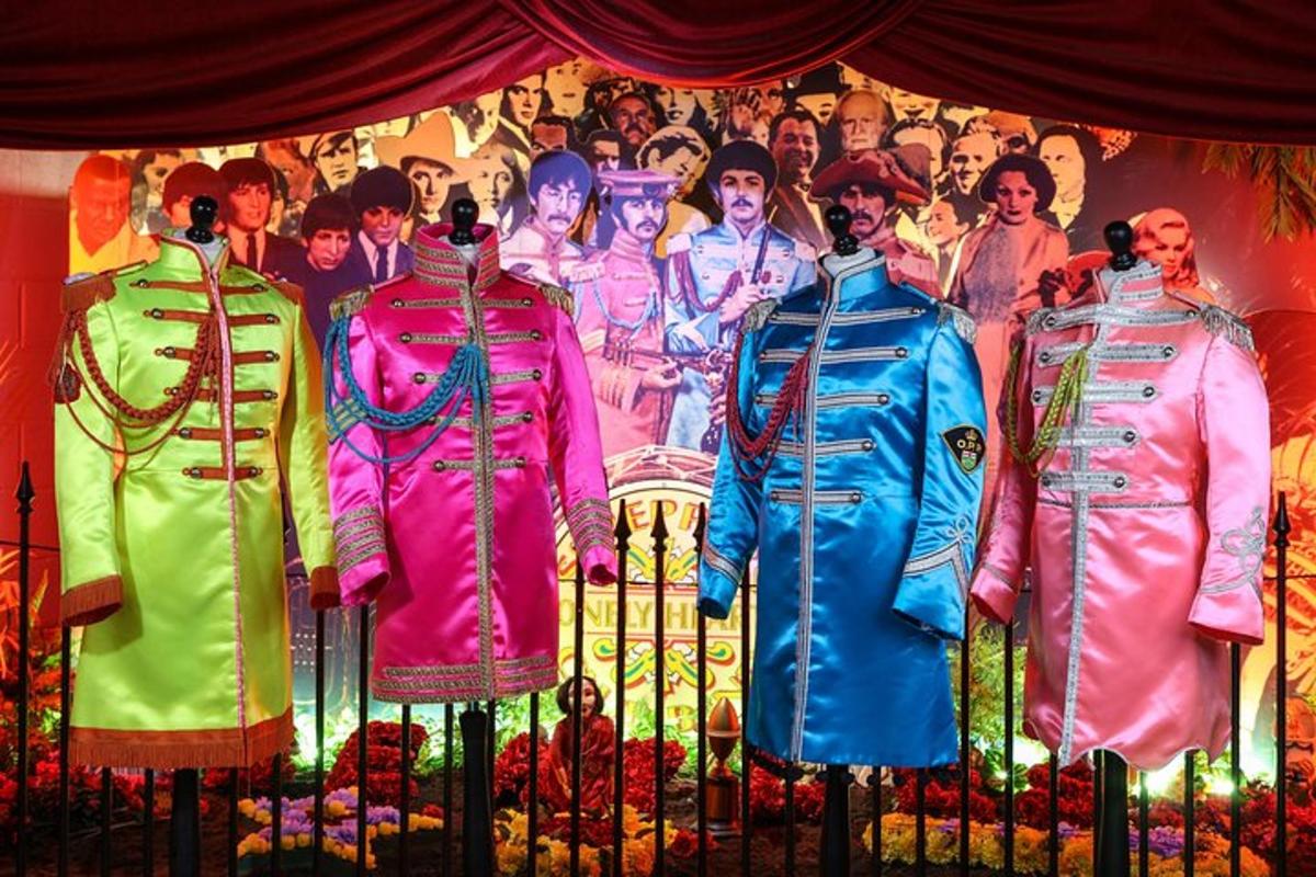 a group of mannequins in front of a display