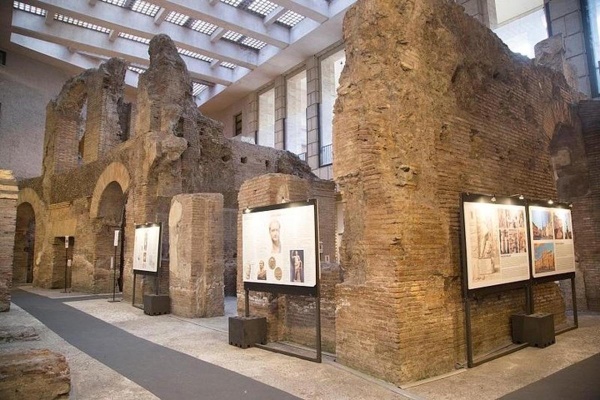 an exhibit in a museum with a large brick wall