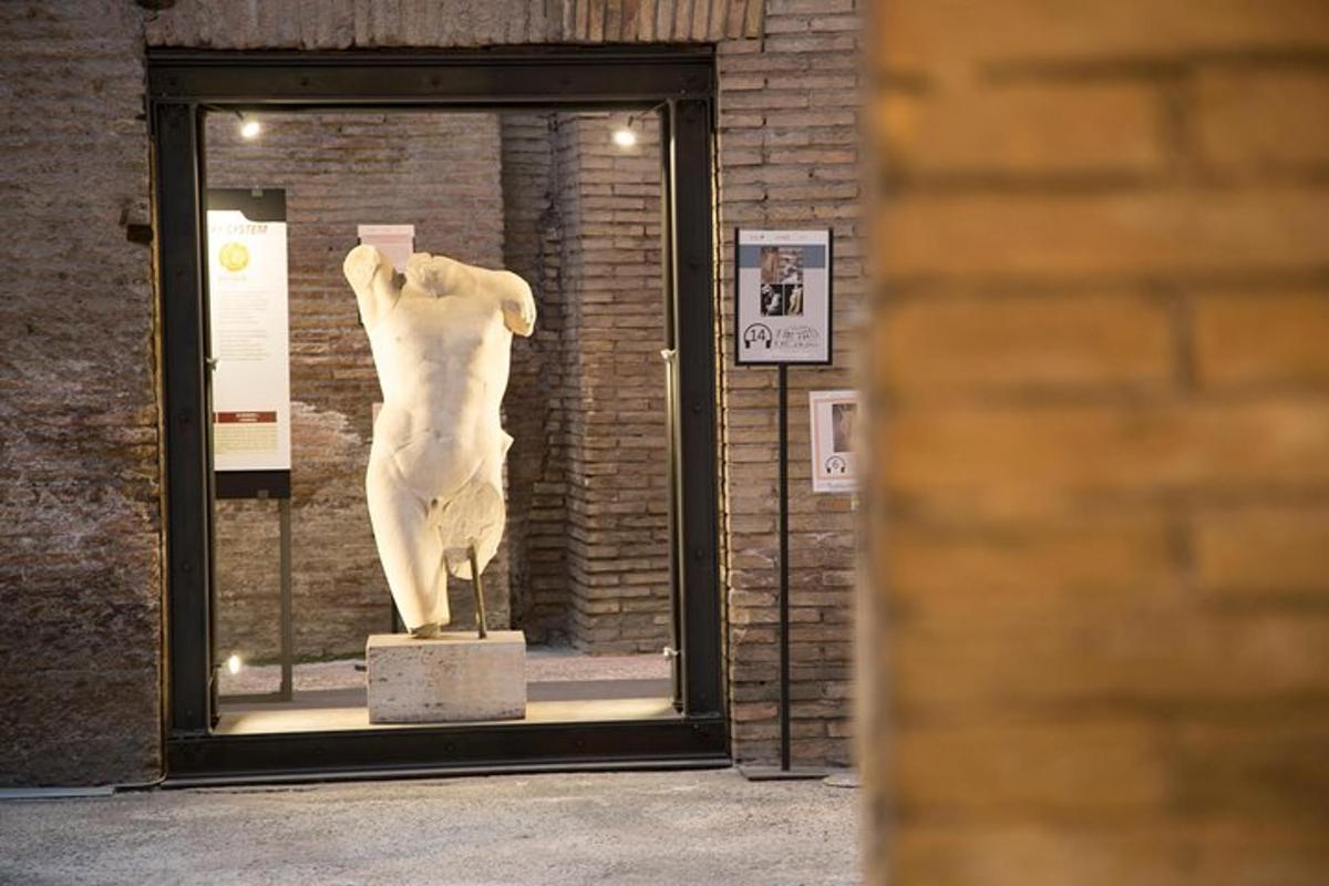 a statue of a dog on display in a window
