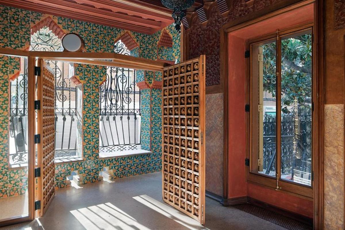 a room with a wall of windows and a door