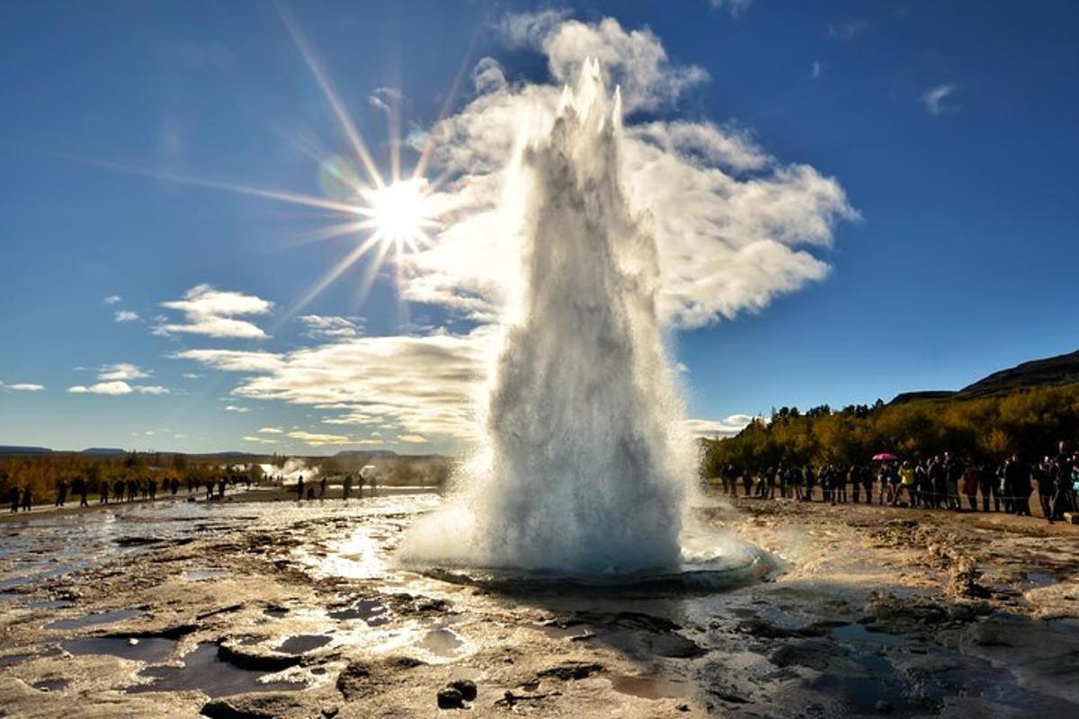 a large geyser in the middle of a field