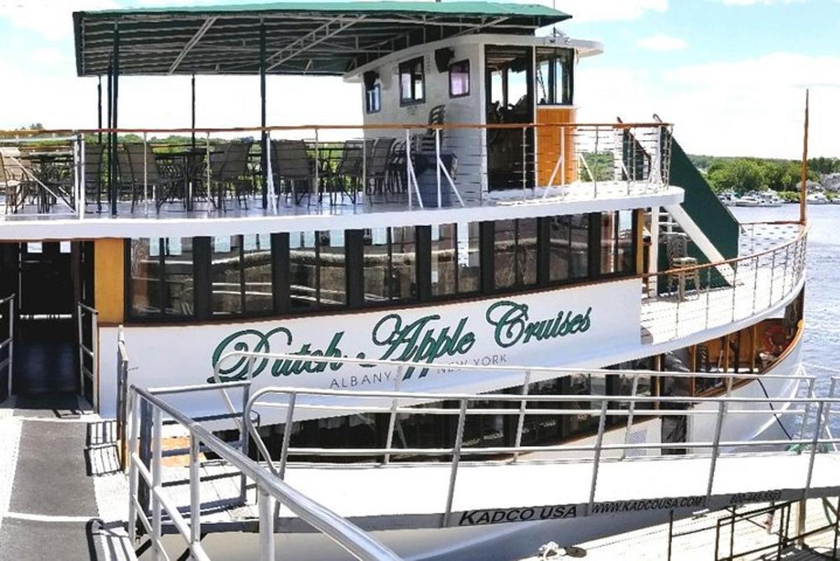 a ferry boat is docked on the water