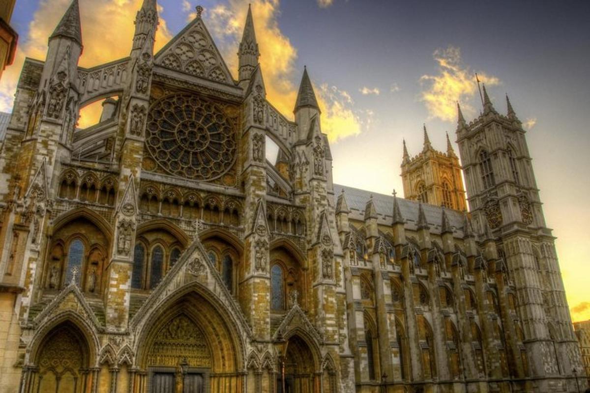 a large cathedral with a clock tower in the background