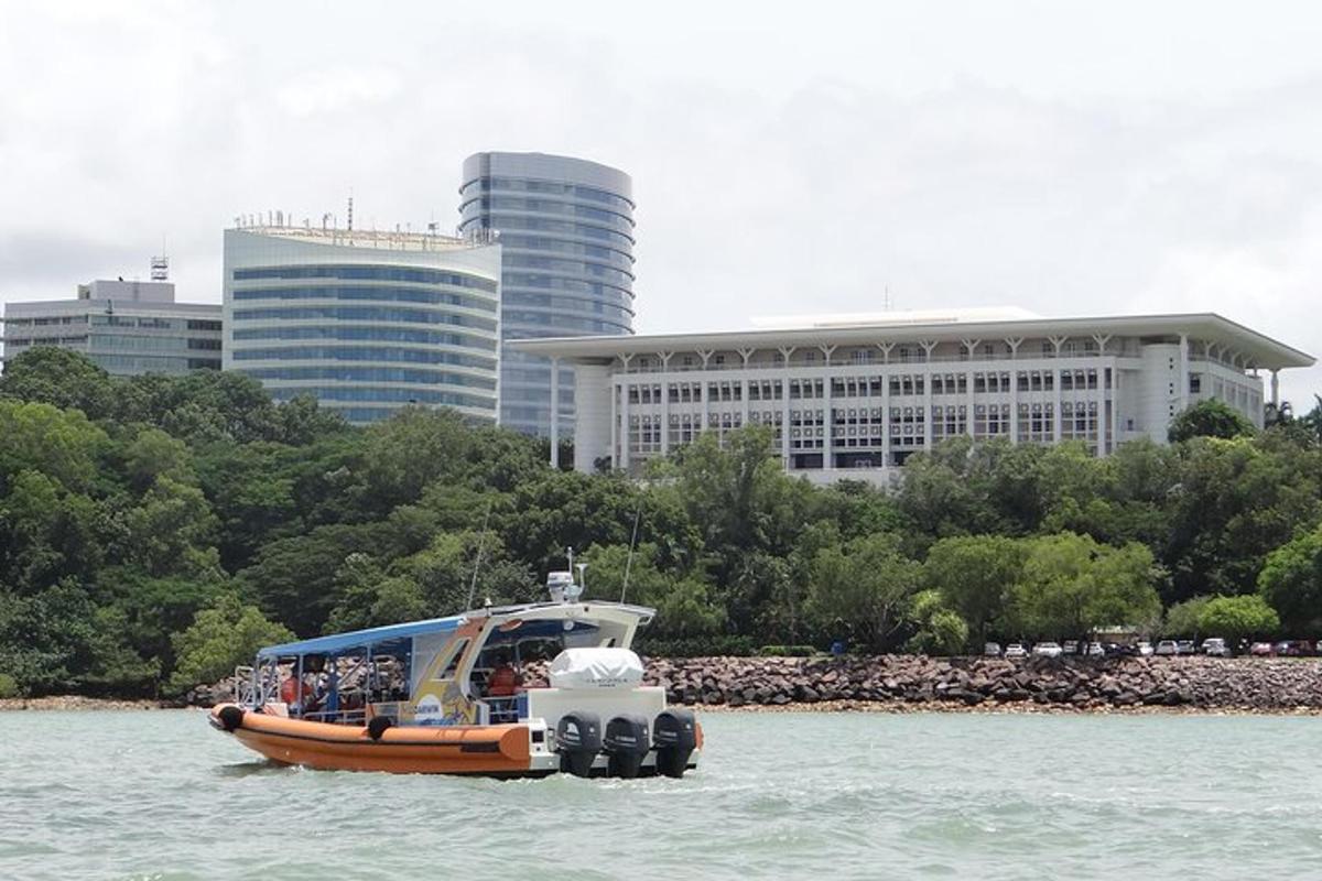 a group of people on a boat in the water