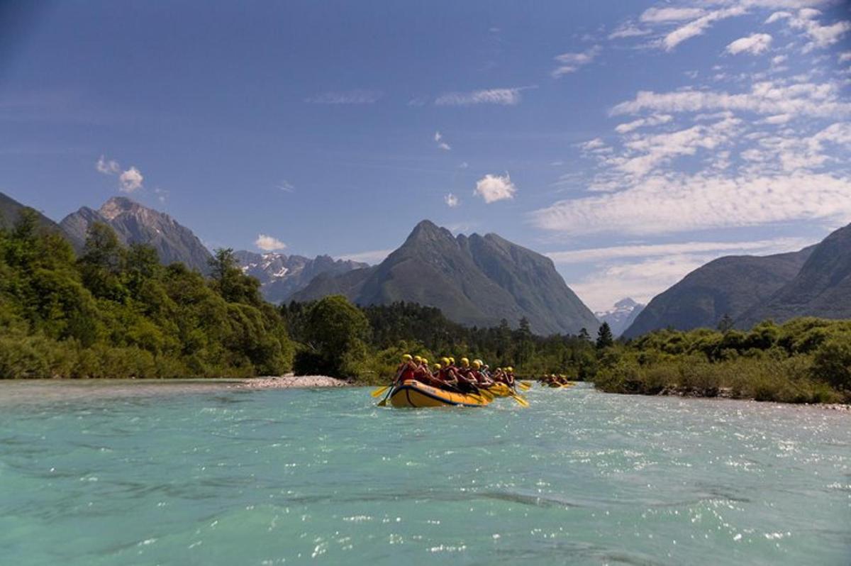 a group of people in a boat on a river