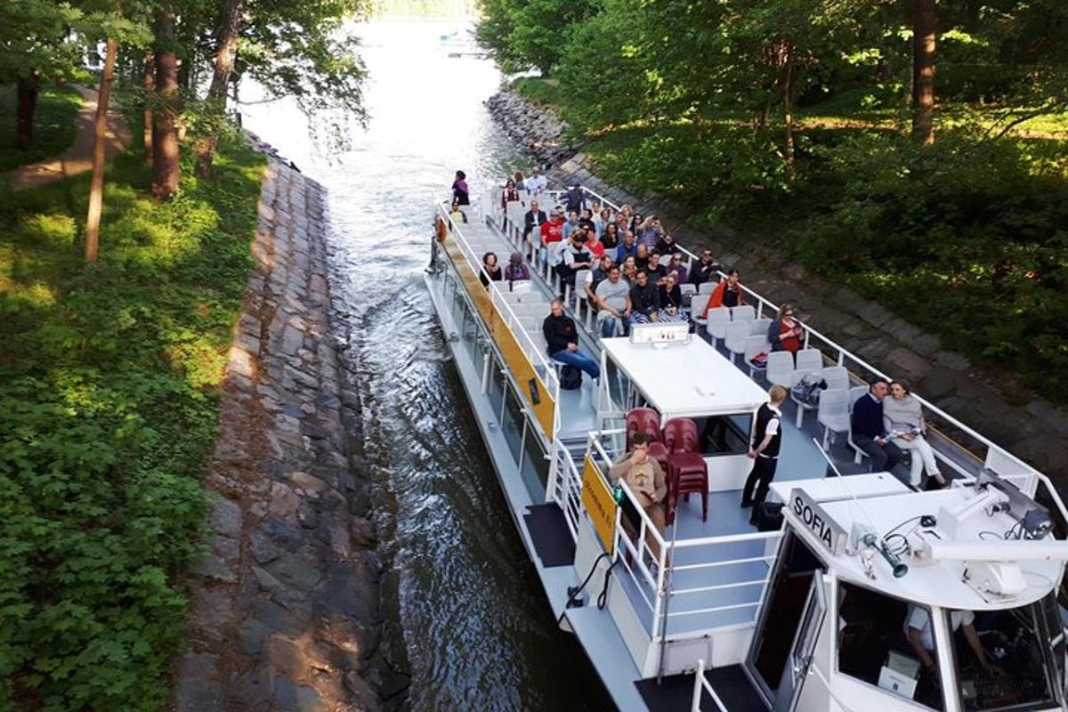 a group of people on a boat in a river