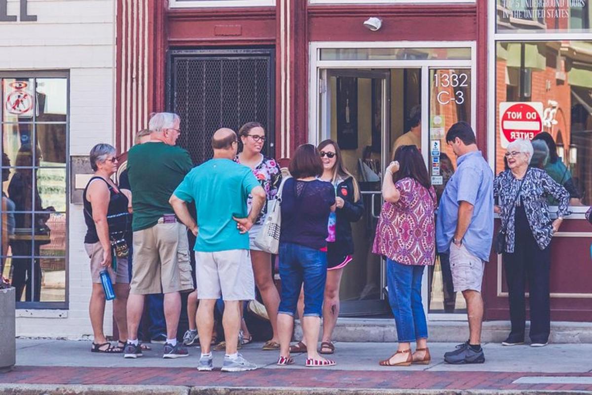 a group of people standing outside of a store
