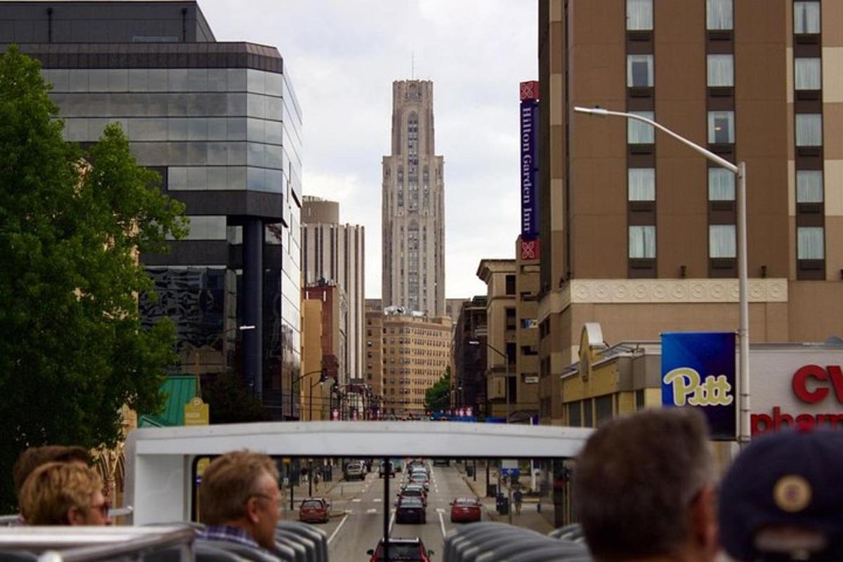 a group of people looking at a busy city street