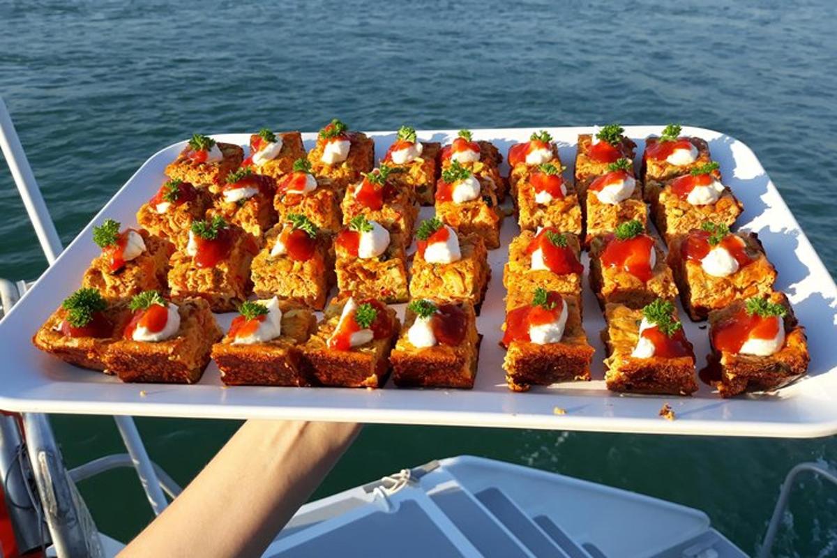 a tray of food sitting on top of a boat