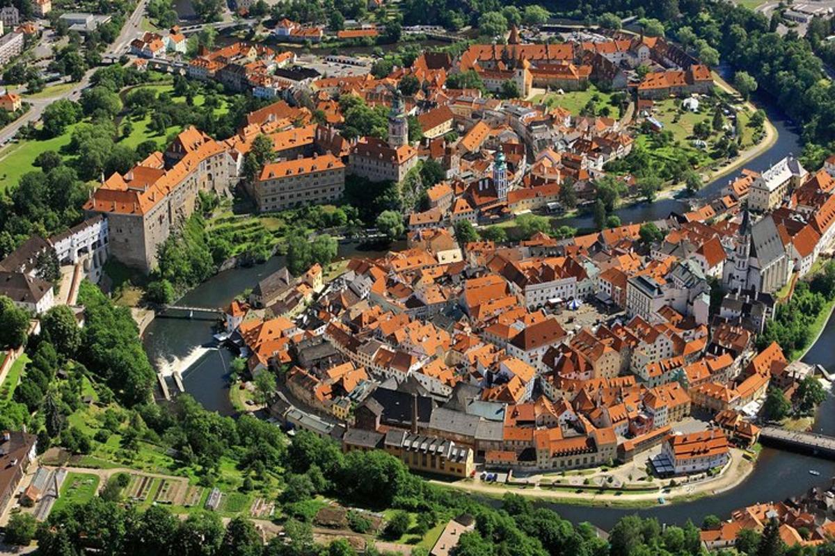 an overhead view of a town with a river