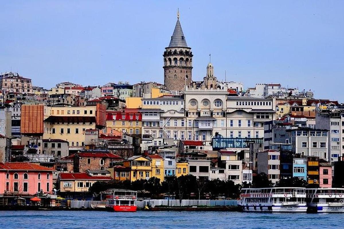 a view of a city from the water with boats