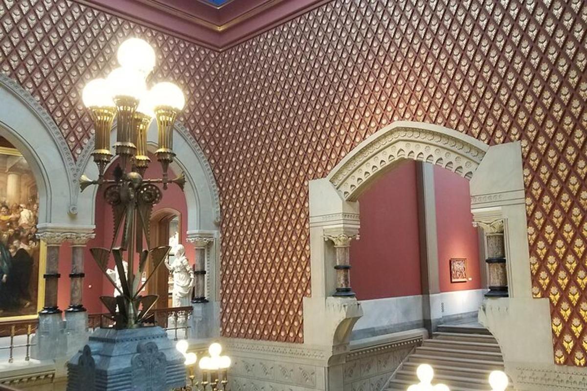 a lobby with a chandelier in a building