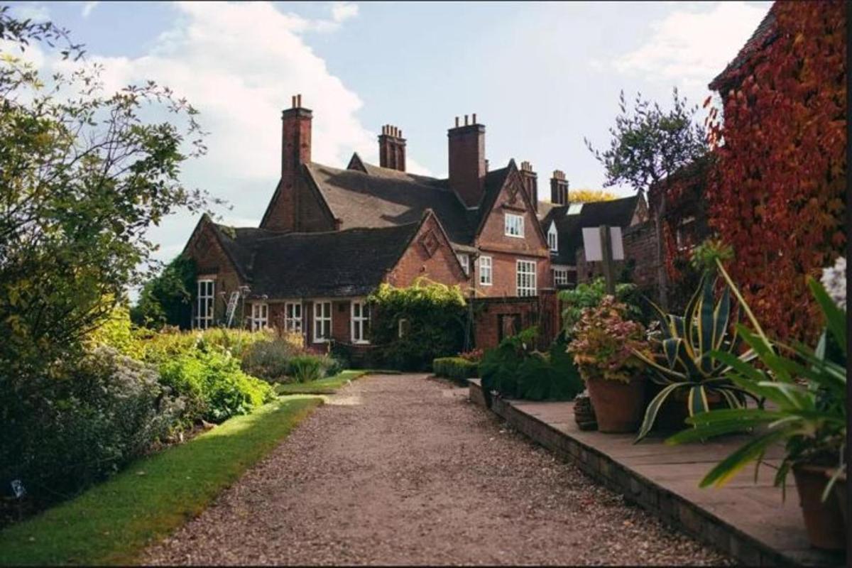 a large house with a driveway in front of it