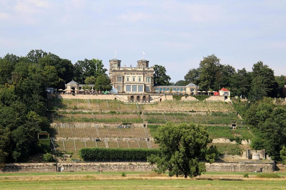 an old house on top of a hill
