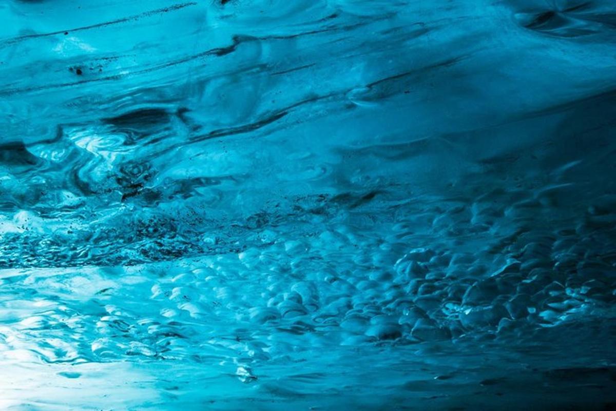 a close up of blue water in a swimming pool