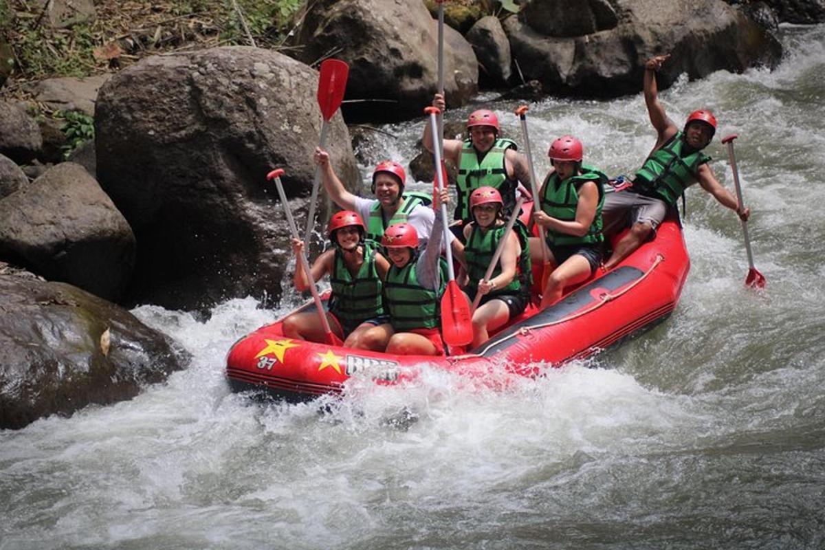 a group of people in a raft on a river