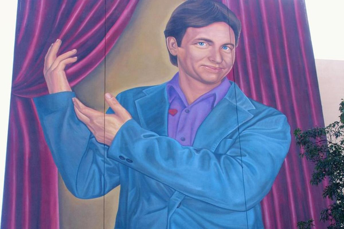 a painting of a man standing in front of a curtain
