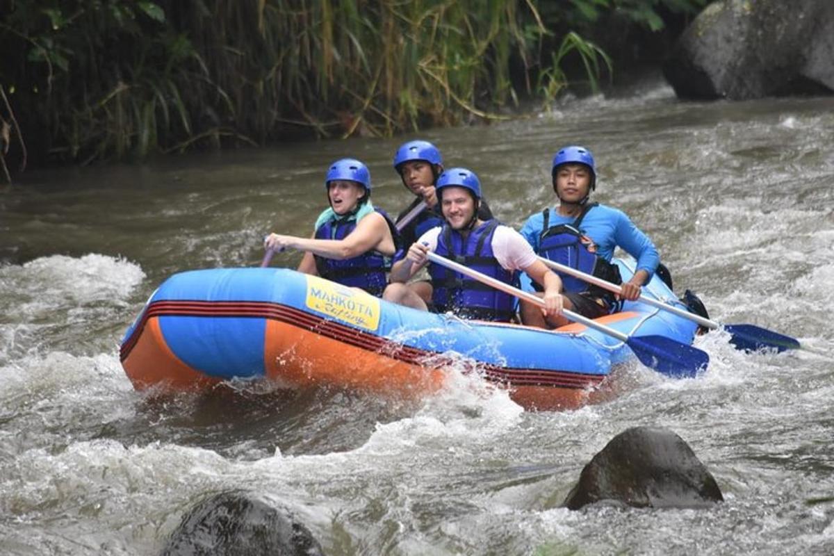 a group of people in a raft on a river