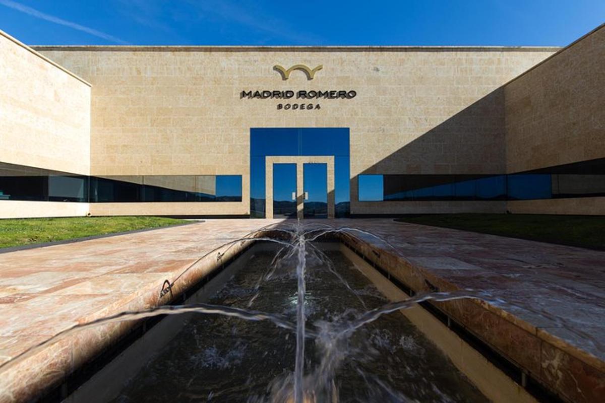 a building with a water fountain in front of it