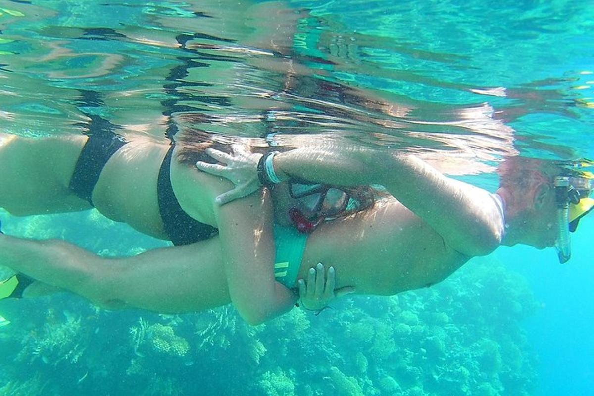 a woman is swimming in the water