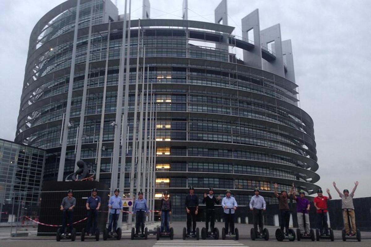 a group of people standing in front of a building