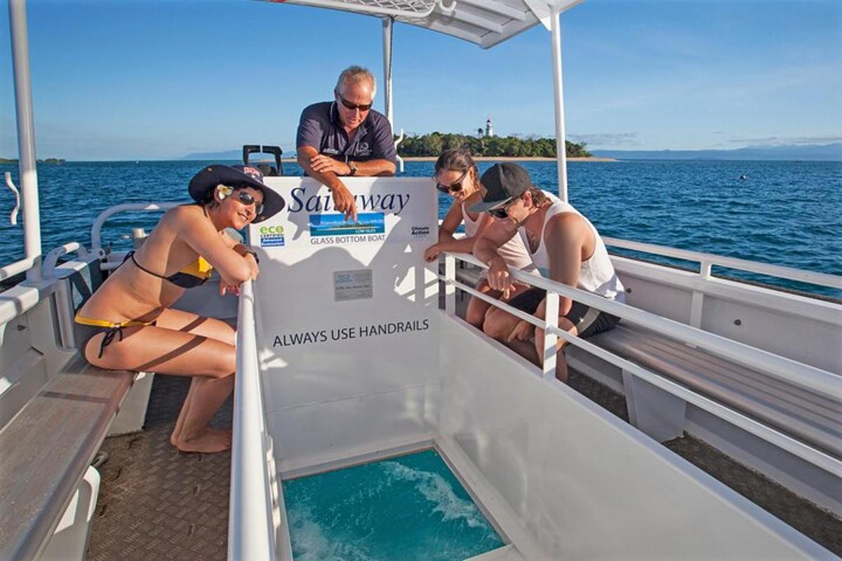 a group of people on a boat in the water